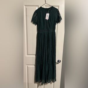 Dress; hunter green lacy. Tea length.